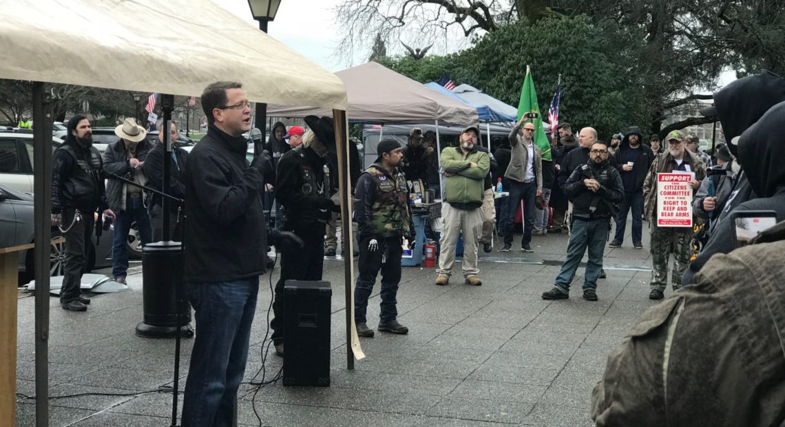 Washington state Rep. Representative Matt Shea, R-Spokane, speaks at the ''Rally 4 UR Rights'' gun rights rally in front of the state Capitol steps in 2018. CREDIT: ENRIQUE PEREZ DE LA ROSA / NORTHWEST NEWS NETWORK