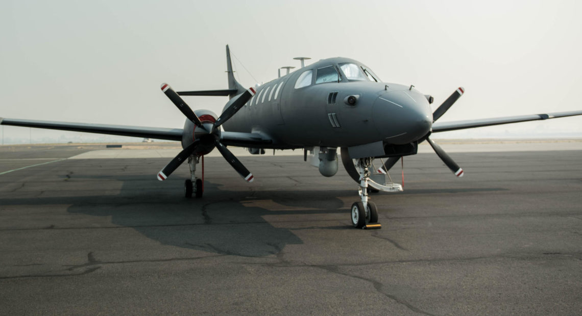 The Washington Air National Guard RC-26 sits at Medford Airport last September before taking off to map the Chetco Bar fire in southwest Oregon. SENIOR AIRMAN SEAN CAMPBELL / U.S. AIR FORCE