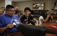 Angel prepares for computer class at Minto High School. Elissa Nadworny/NPR