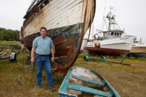 Abandoned boats await recycling in a yard at the Port of Ilwaco. Port Manager Guy Glenn hopes to construct a recycling center there to handle Southwest Washington’s derelicts. DNR is helping to fund the project with a nearly $1 million grant as part of a rural communities program. CREDIT: MATT M. MCKNIGHT