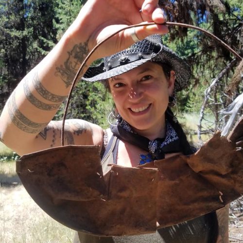 Southern Oregon University archaeologist Chelsea Rose with remnants of a five-part gold pan found during a dig this summer. CREDIT SOUTHERN OREGON UNIV. LABORATORY OF ANTHROPOLOGY