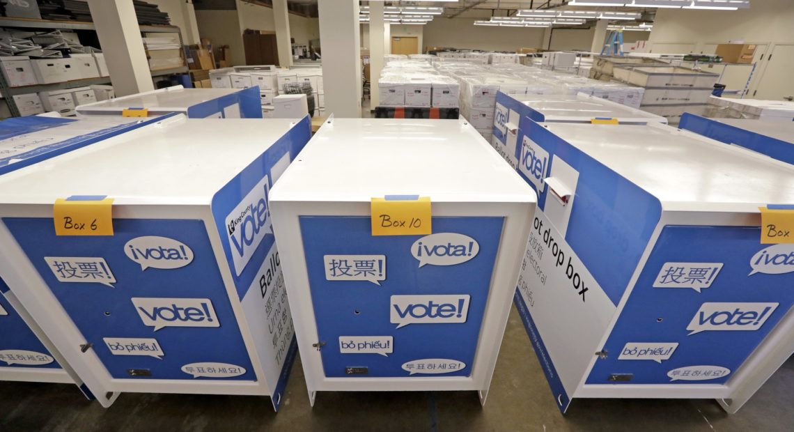 Ballot drop boxes are stored for future use in a warehouse area of the King County Elections office in Renton, Wash. While Washington is one of just three states that conduct all of their elections by mail, it's the only one of those three that allows ballots to be postmarked by election day. CREDIT: ELAINE THOMPSON