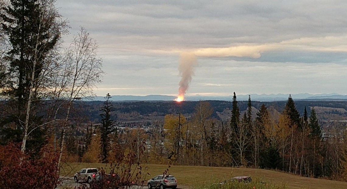 An explosion near the community of Shelley, British Columbia, Tuesday, Oct. 9, 2018. The massive pipeline explosion risks cutting off the flow of Canadian natural gas to Washington, and companies are urging customers to conserve. CREDIT: DHRUV DESAI via AP