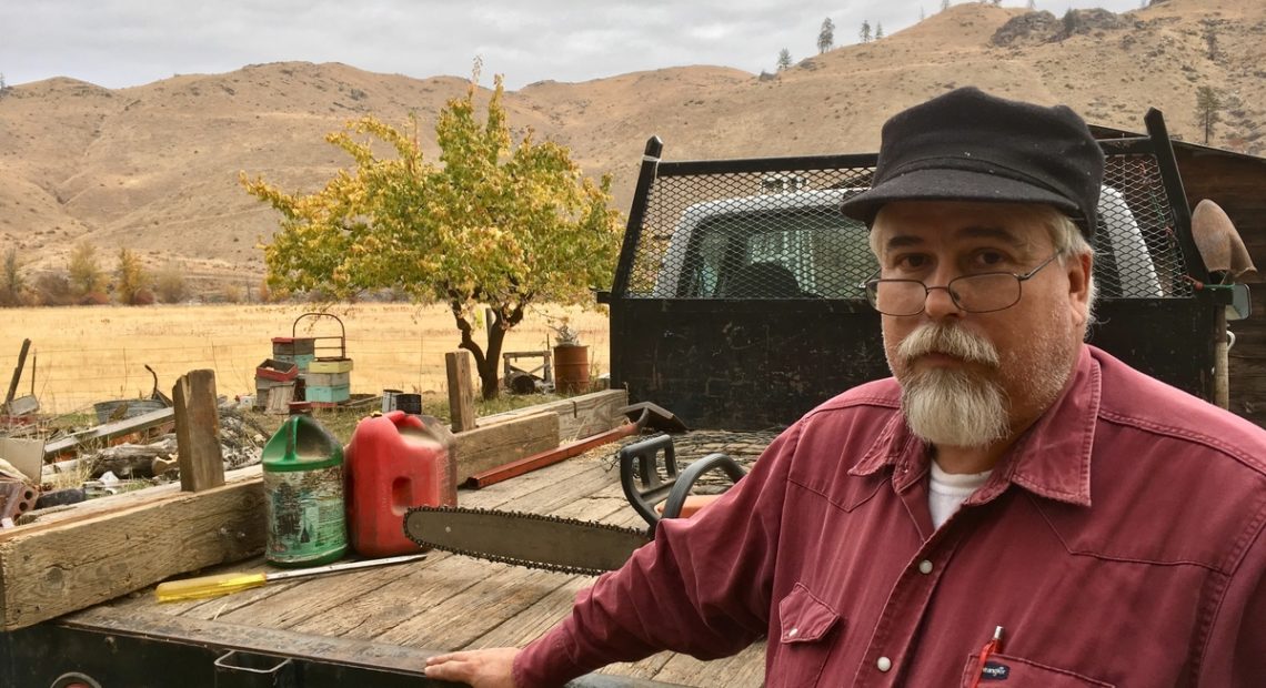 Rancher Dave Creveling believes the cost of a new Washington state carbon fee would be passed along to rural people like him if voters approve it. CREDIT: ASHLEY AHEARN