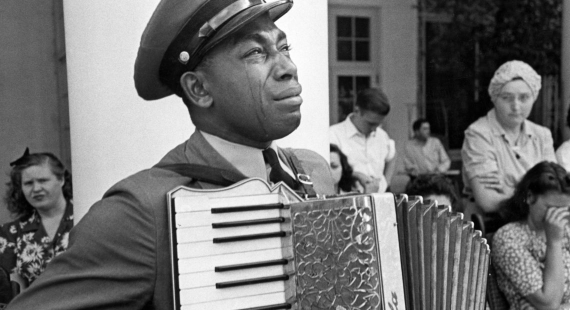 U.S. Navy CPO Graham Jackson, with tears of grief, plays "Goin' Home," from Dvorak's 'New World' Symphony, as President Franklin D. Roosevelt's body is carried from Warm Springs, Ga., where he died. CREDIT: Ed Clark/Life Picture Collection/Getty