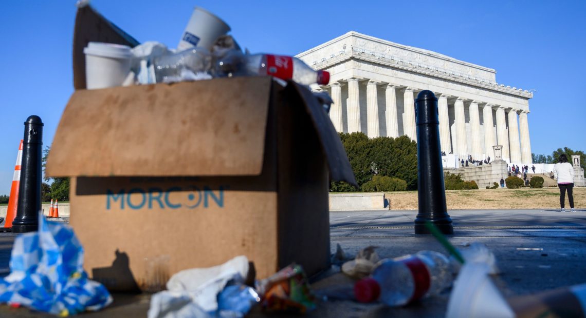 A box of trash overflows near the Lincoln Memorial in Washington, D.C., this week as some government services have been stopped during a partial government shutdown. CREDIT: Andrew Caballero-Reynolds/AFP/Getty Images