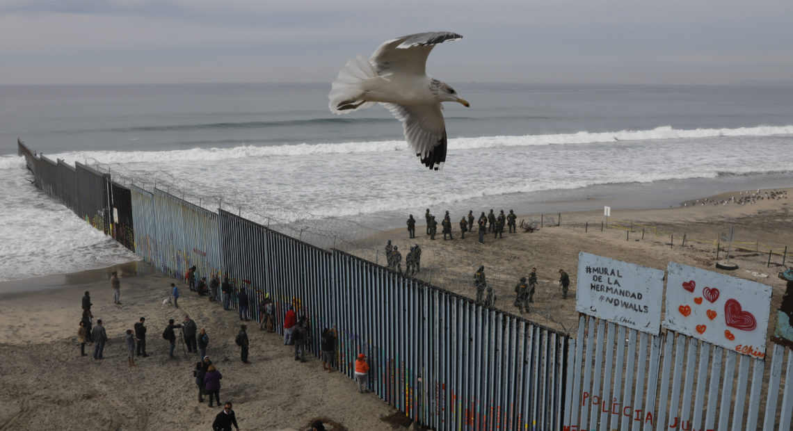 The westernmost edge of the U.S. border wall separates Tijuana from San Diego. Most undocumented immigrants in this country did not enter the U.S. at the Southern border. CREDIT: Rebecca Blackwell/AP