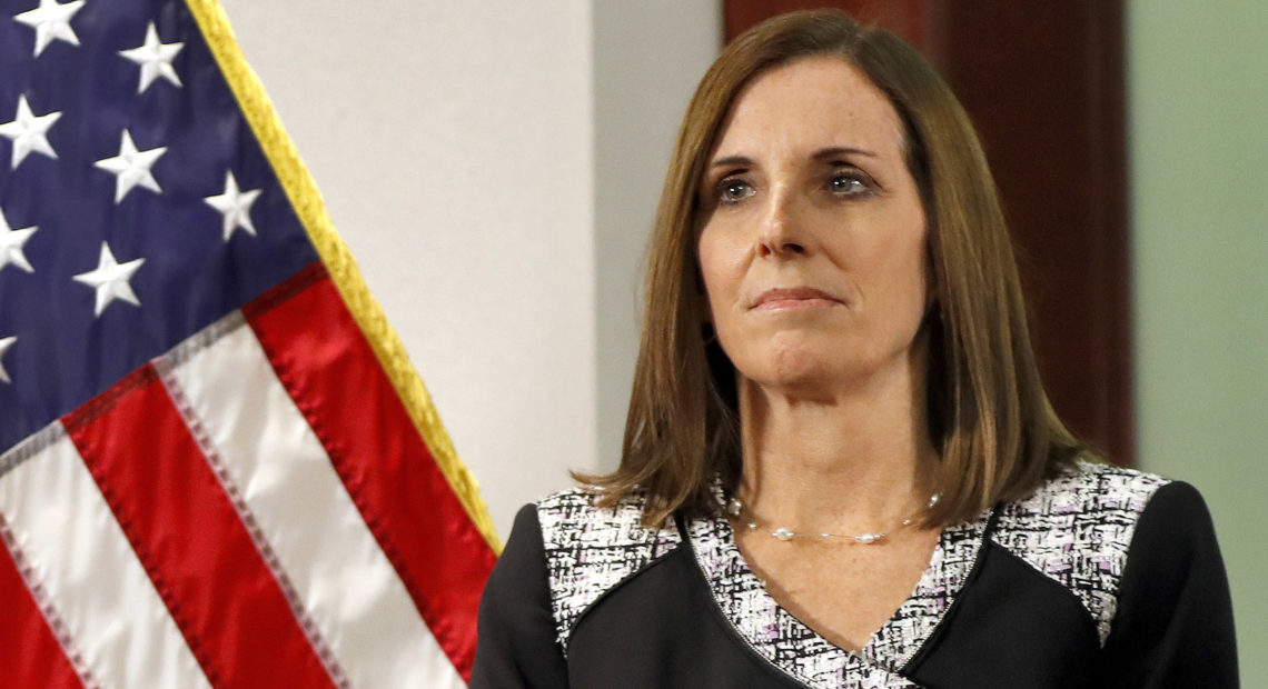 Sen. Martha McSally, R-Ariz., testified on Wednesday that she was raped while serving in the Air Force. Matt York/AP