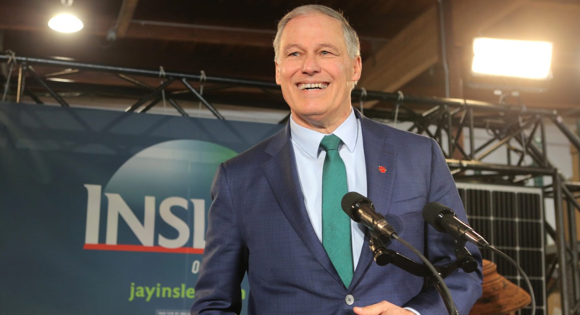 Washington Gov. Jay Inslee announces his run for the 2020 presidency at A&R Solar on March 1 in Seattle. He says tackling climate change should be "Job 1" for the next president. CREDIT: Karen Ducey/Getty Images