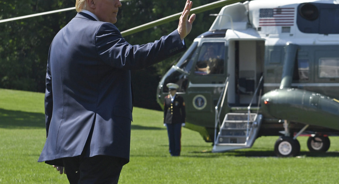 President Trump called off planned nationwide immigration raids Saturday for two weeks, calling on Democrats to close asylum law "loopholes." Susan Walsh/AP