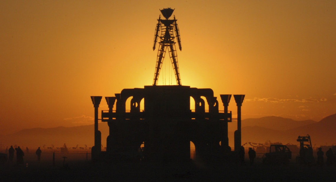 The U.S. Bureau of Land Management is recommending attendance be capped at existing levels for the next 10 years at the annual Burning Man counterculture festival in the desert 100 miles north of Reno, Nev. Burning Man organizers had proposed raising the current 80,000 limit as high as 100,000 in coming years. Ron Lewis/AP