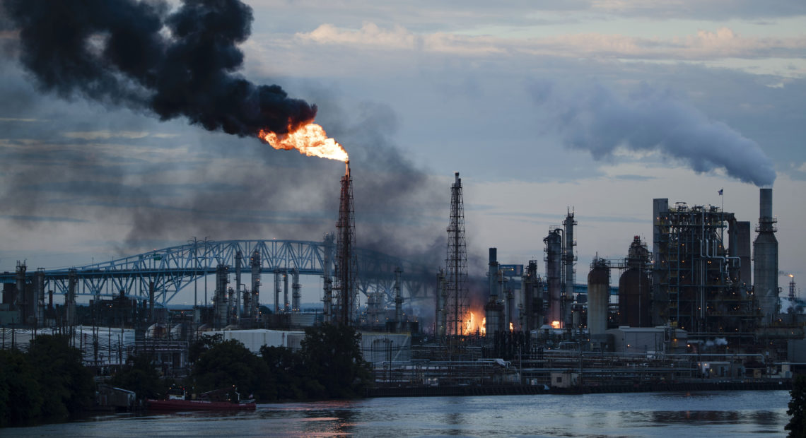 Flames and smoke emerge from the Philadelphia Energy Solutions refinery in Philadelphia on June 21. Experts say the explosions could have been far more devastating if deadly hydrogen fluoride had been released. CREDIT: Matt Rourke/AP