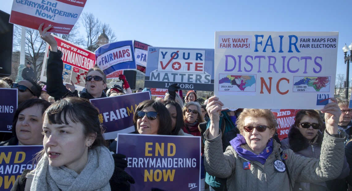 Protesters against gerrymandering at a March 2019 rally coinciding with Supreme Court hearings on major redistricting cases. After the court said the federal judiciary has no role in partisan redistricting cases, legal action is focused on state courts. Tasos Katopodis/Getty Images