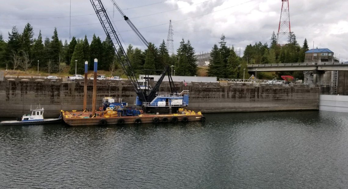 This Sunday, Sept. 8, 2019 photo provided by the U.S. Army Corps of Engineers shows a boat lock on the Bonneville Dam on the Columbia River that connects Oregon and Washington at Cascade Locks., Ore. A critical lock has shut down for repairs, meaning barges that shuttle millions of tons of wheat, wood and other inland goods to the Pacific Ocean for transport to Asia can't move. CREDIT: U.S. Army Corps of Engineers/Twitter