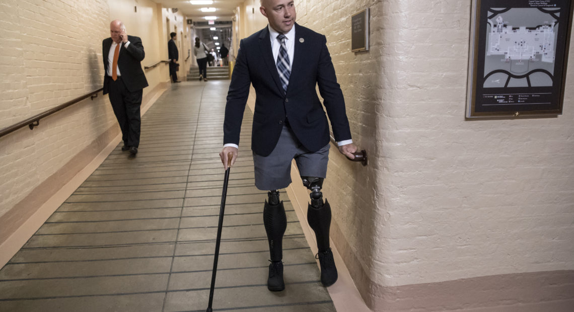 Rep. Brian Mast, R-Fla., and other members of Congress are appealing a decision by the Department of Veterans Affairs to evict them from office spaces at VA hospitals. J. Scott Applewhite/AP