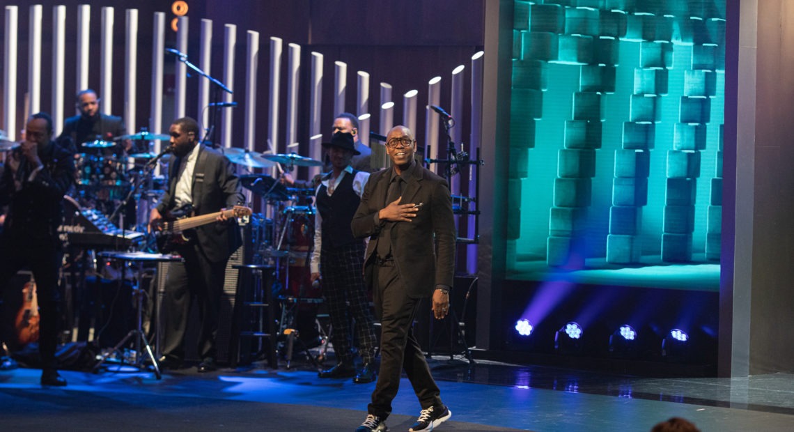 Dave Chappelle accepts the Mark Twain Prize for American Humor at the John F. Kennedy Center for the Performing Arts. PBS will air a television special of the ceremony in January. Tracey Salazar/Courtesy of the Kennedy Center