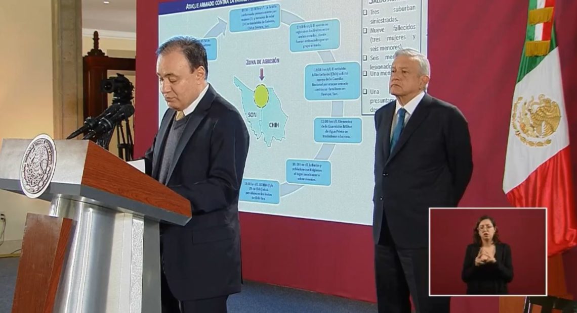 Members of the extended LeBaron family were caught in a brutal attack, Mexican officials say. Here, President Andrés Manuel López Obrador looks on as Security Minister Alfonso Durazo discusses the attack during a news conference Tuesday morning. President Andrés Manuel López Obrador via Facebook