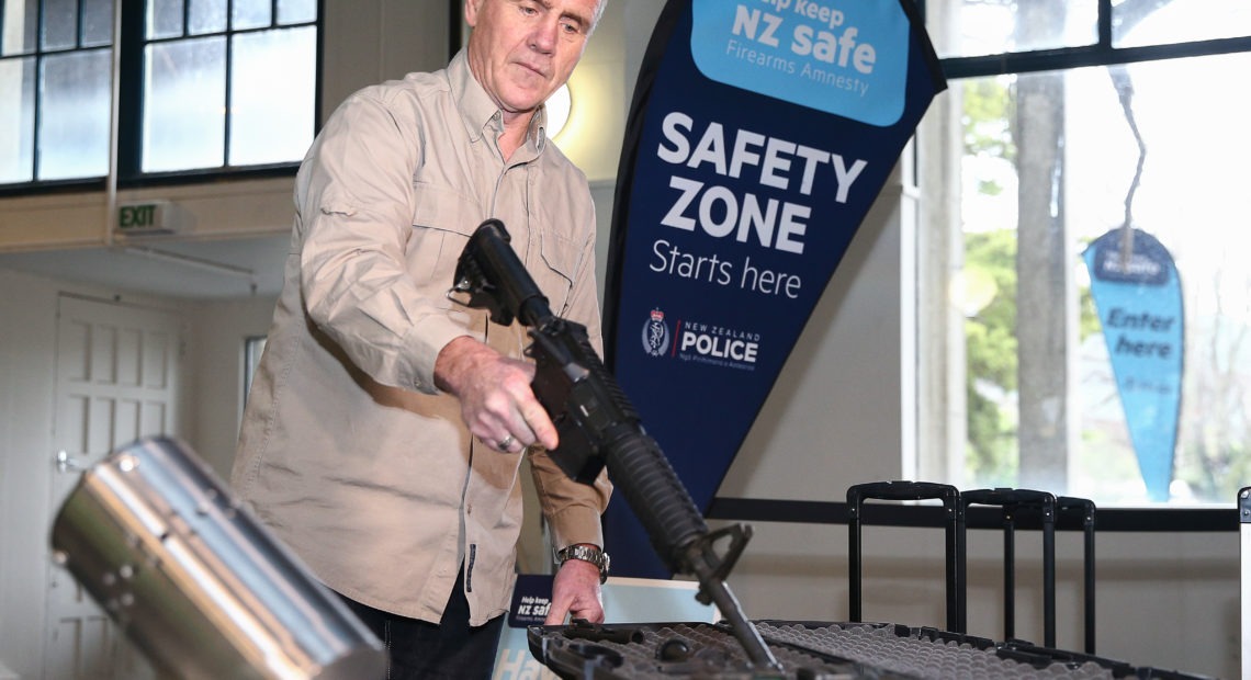 A gun is prepared for use in a bullet trap as part of a demonstration during a firearm buy-back collection event on July 4 in Wellington, New Zealand. CREDIT: Hagen Hopkins/Getty Images