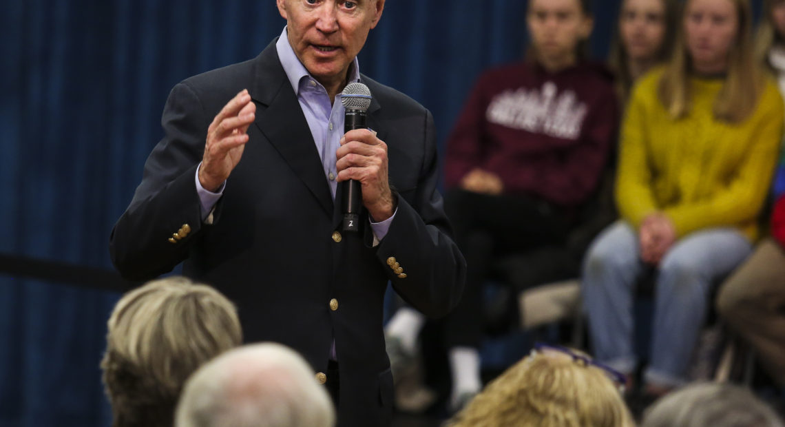 Former Vice President Joe Biden at a town hall last month. On Thursday, Biden got into a heated exchange with an Iowa voter, calling the man a "damn liar." CREDIT: Boston Globe via Getty Images