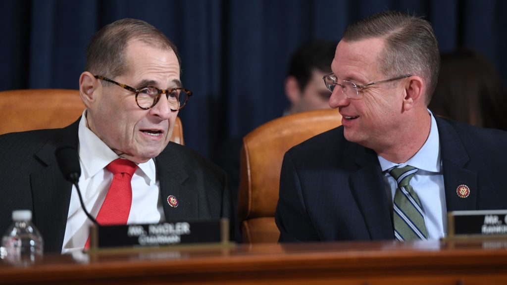 House Judiciary Chairman Jerry Nadler, D-N.Y., speaks with ranking member Doug Collins, R-Ga., at Monday's impeachment hearing. CREDIT: Saul Loeb/AFP via Getty Images