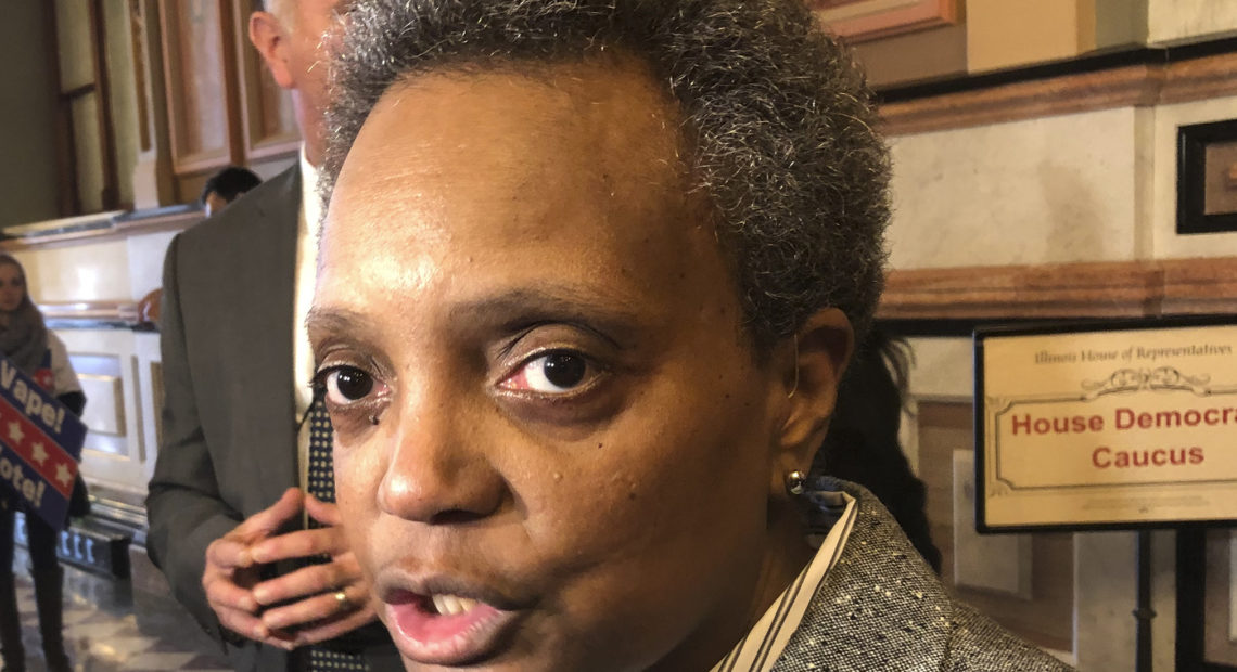 Chicago Mayor Lori Lightfoot is urging potential witnesses of the shooting to come forward and assist police with the investigation. "We can't normalize this kind of behavior," she said. John O'Connor/AP