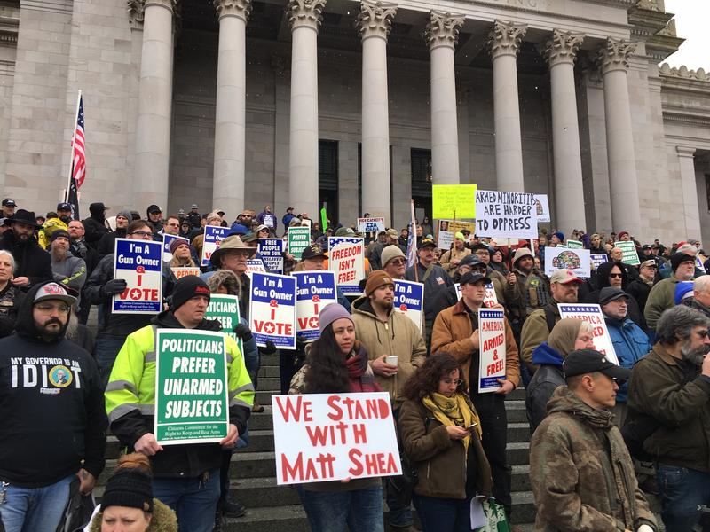 Gun-rights supporters rally on the steps of the Washington state Capitol on Friday. Among the speakers was Republican state Rep. Matt Shea who participated in an act of domestic terrorism, according to a recent House investigation.