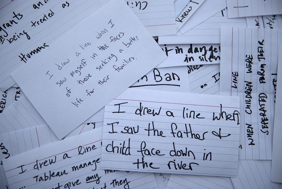 Notecards handwritten by Tableau employees from a recent rally at Gas Works Park reveal what personally motivated them to 'draw a line', are shown on Wednesday, December 4, 2019, in Seattle.