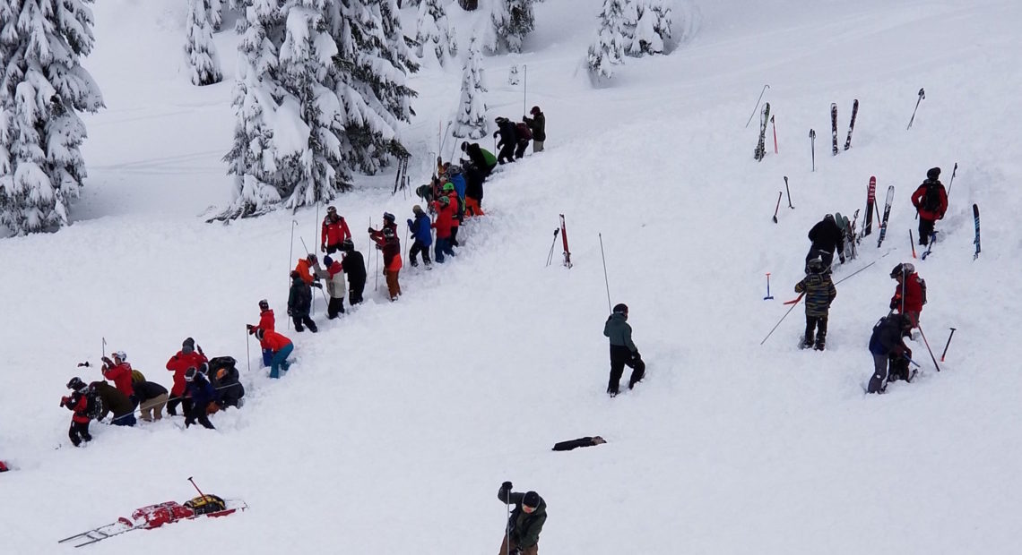 Search and rescue team members search for victims Tuesday, Jan. 7 at Silver Mountain Resort in Kellogg, Idaho. Courtesy of Hank Lunsford via Spokane Public Radio