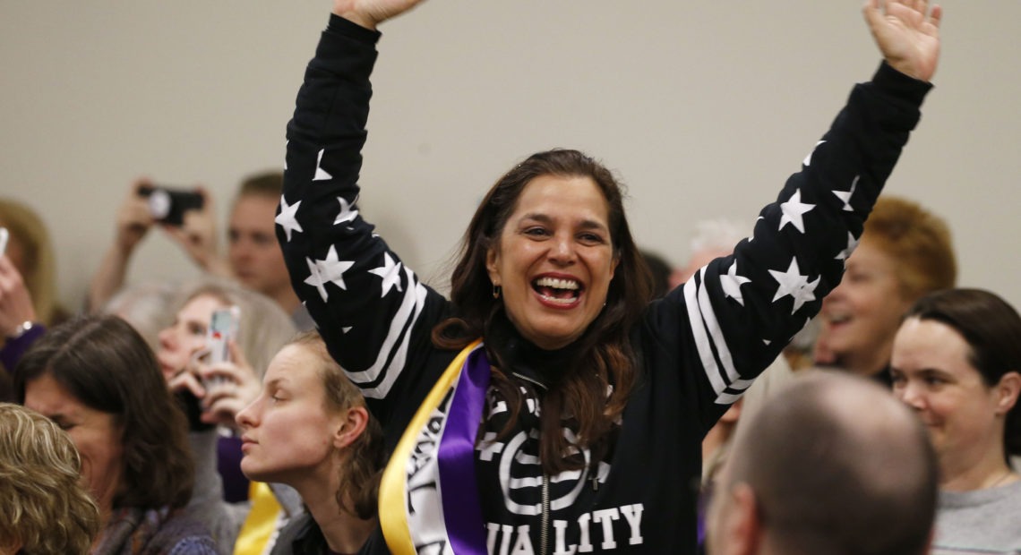 Both houses of Virginia's legislature voted to ratify the Equal Rights Amendment, but the ERA's future is uncertain: Its original deadline elapsed decades ago. Here, an ERA supporter reacts to a Virginia Senate committee's vote to advance the ERA amendment last week. CREDIT: Steve Helber/AP