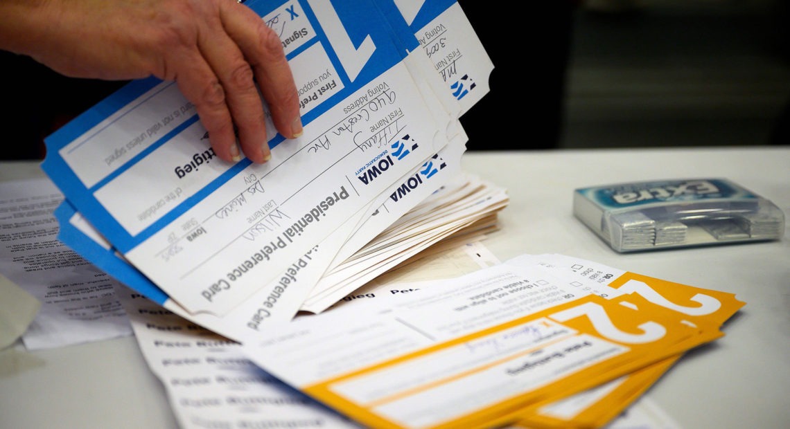 Votes are counted during caucusing in the 66th precinct at Abraham Lincoln High School in Des Moines, Iowa. Jim Watson/AFP/Getty Images