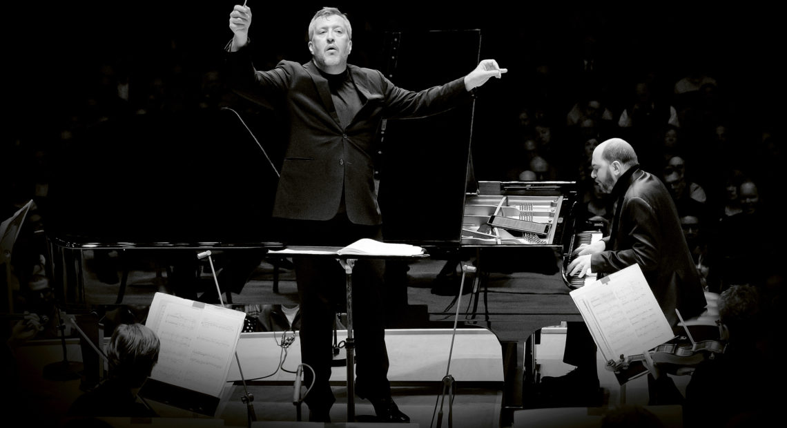 British composer Thomas Adès leads the Boston Symphony Orchestra, and soloist Kirill Gerstein, in the premiere performances of his Concerto for Piano and Orchestra at Symphony Hall in Boston. CREDIT: Winslow Townson/Deutsche Grammophon