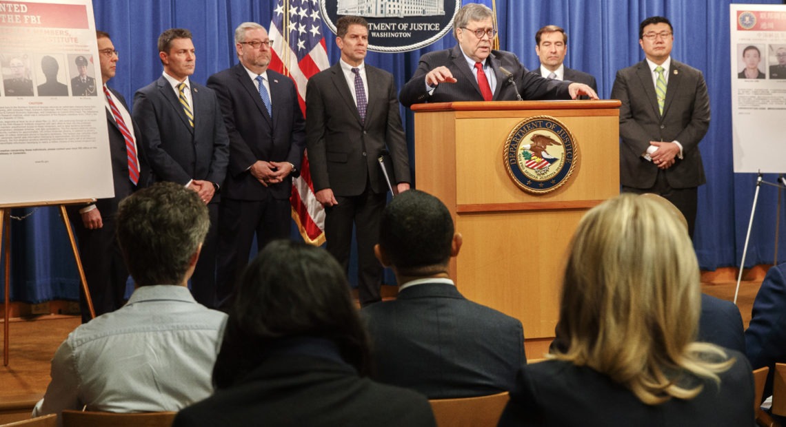 Attorney General William Barr and top law enforcement officials announced what they called a huge cyberattack on Monday at the Justice Department. CREDIT: Jacquelyn Martin/AP