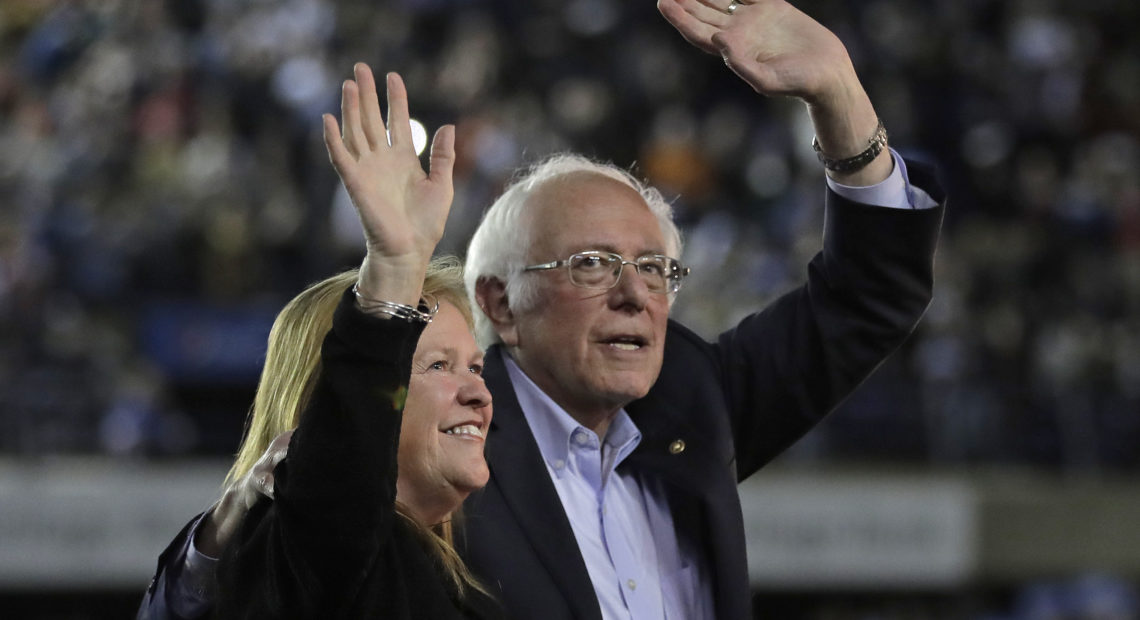 Democratic presidential candidate Sen. Bernie Sanders, I-Vt., waves with his wife, Jane, after his speech at a campaign event in Tacoma, Wash., on Feb. 17.