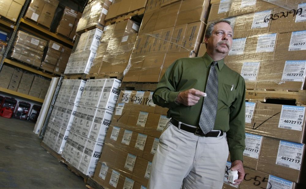 File photo. Don Wood, an official with the Strategic National Stockpile, awaits another truck load of medications in Salt Lake City, Utah during a swine flu outbreak from the H1N1 virus in 2009. The pandemic that year prompted the largest use to date of the stockpile, which was created in 1999. It has never confronted anything on the scale of the current COVID-19 pandemic. CREDIT: Francisco Kjolseth/AP