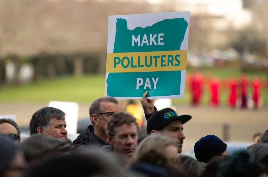 People gather on the steps of the Oregon Capitol in Salem for a rally for climate action on Feb. 11, 2020. CREDIT: Kaylee Domzalski/OPB