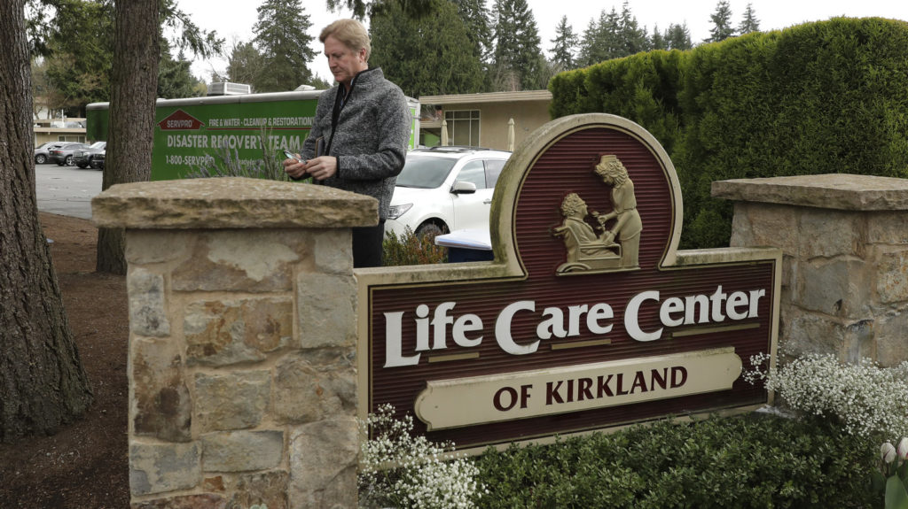 Tim Killian, a spokesman for Life Care Center in Kirkland, Wash., prepares to give a daily briefing to reporters on Wednesday. CREDIT: Ted S. Warren/AP