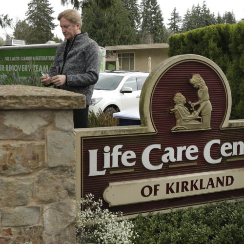 Tim Killian, a spokesman for Life Care Center in Kirkland, Wash., prepares to give a daily briefing to reporters on Wednesday. CREDIT: Ted S. Warren/AP