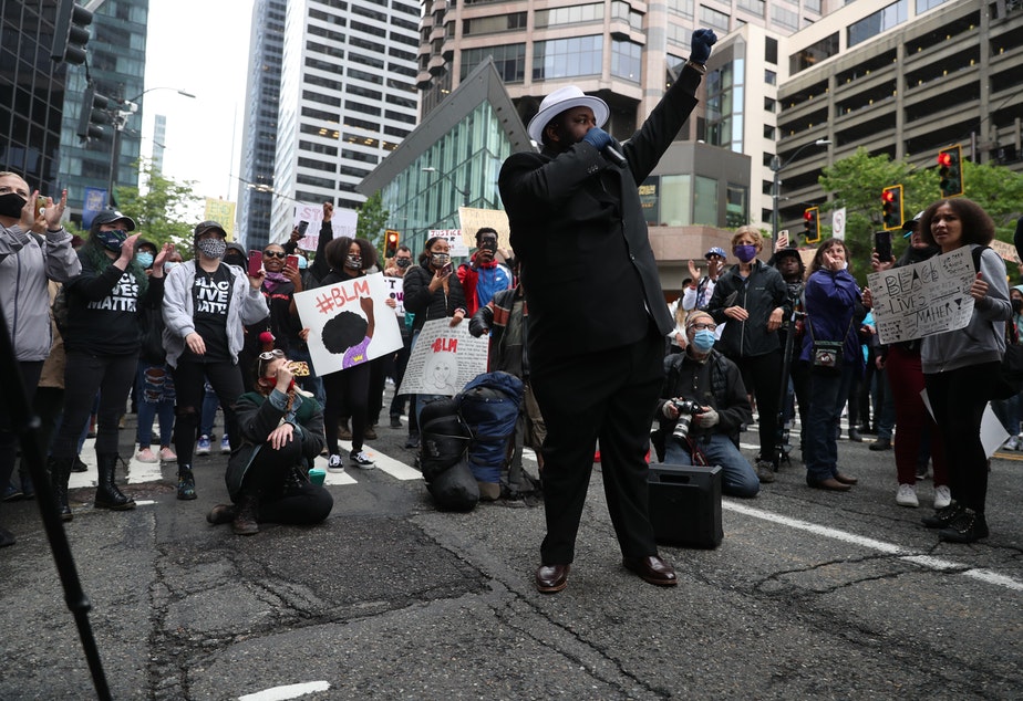 Protesters gather at 5th Avenue and Cherry Street in downtown Seattle on Saturday, May 30, 2020. They were protesting the death in Minneapolis of an African American man, George Floyd, in police custody.