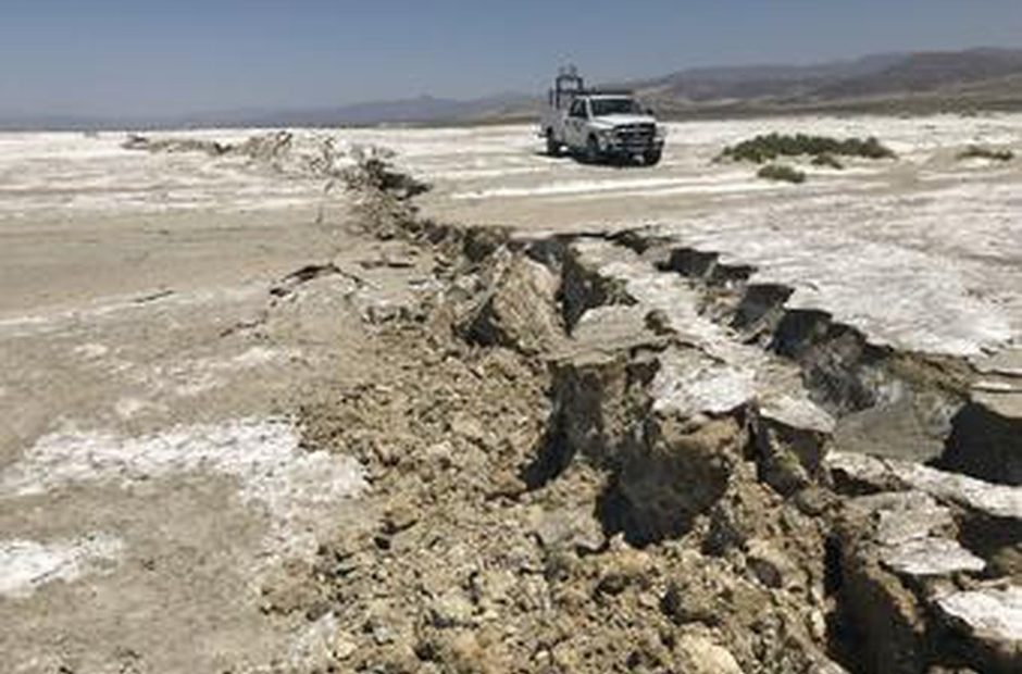 USGS scientists examine a surface rupture created during the M7.1 Searles Valley earthquake in 2019.