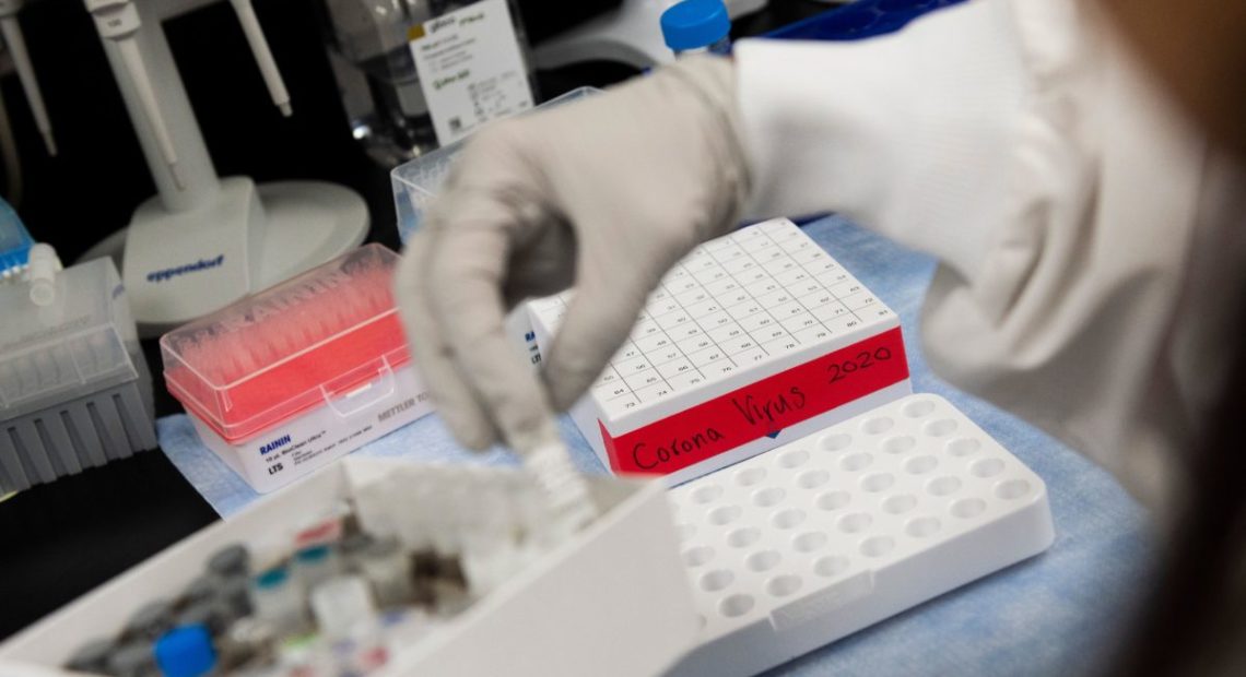 A doctor at Novavax labs in Gaithersburg, Maryland on March 20, 2020, works on developing a vaccine for the coronavirus. CREDIT: Andrew Caballero-Reynolds/AFP