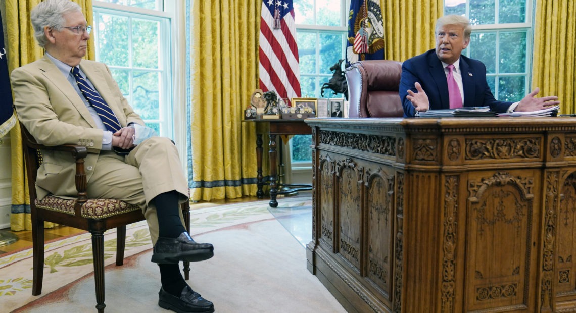 Senate Majority Leader Mitch McConnell, R-Ky., left, with President Trump at the White House. The GOP has unveiled a new pandemic relief bill but tough negotiations lie ahead with Democrats. Evan Vucci/AP