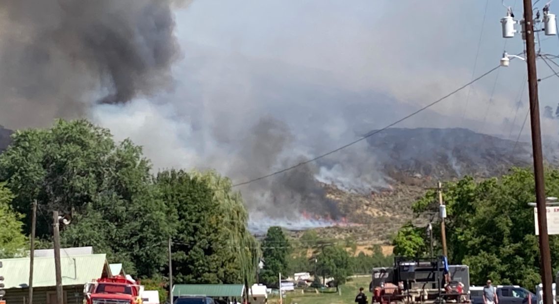 Fire crews were in the town of Loomis, on the Palmer Fire's southwestern edge, Aug. 22-23. The conducted burnout operations to help clear fuel. CREDIT Alan Lebovitz/WA DNR