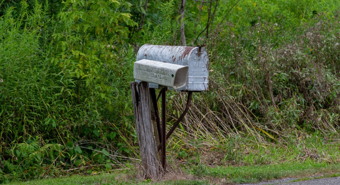 The U.S. Postal Service warned states in late July that it might not be able to deliver mail-in ballots in time to be counted. Amid a growing outcry from rural leaders, the agency's director has backed down from planned broad cuts and changes. CREDIT: aul Weaver/Pacific Press/LightRocket via Getty Images