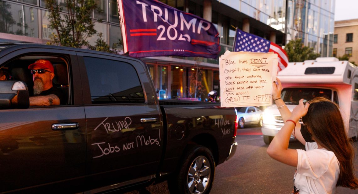 President Trump has threatened to intervene in what he calls a "mess" in Portland, Ore., after clashes between Trump supporters and Black Lives Matter demonstrators left one man dead over the weekend. CREDIT: John Rudoff/Anadolu Agency via Getty Images