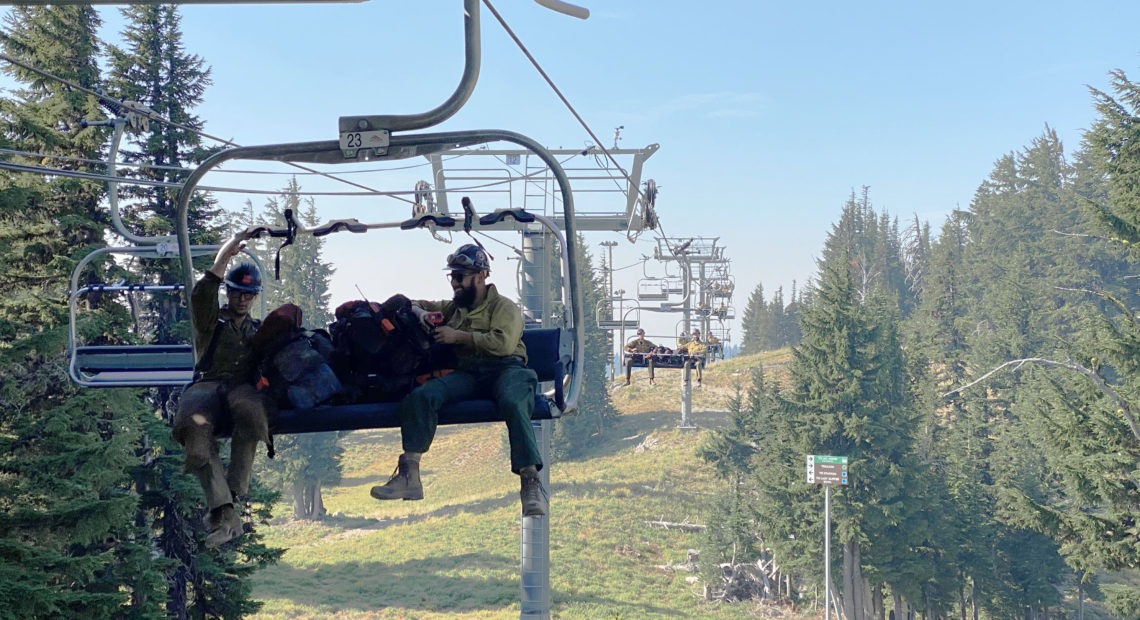 Fire crews rode an express chairlift at Mount Hood Meadows to more easily reach a fire burning in the ski area's expert-level terrain on Sept. 7, 2020.