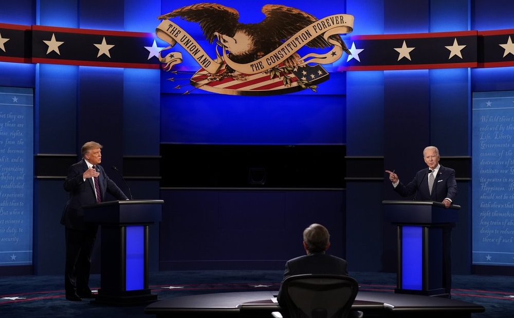 President Donald Trump and Democratic presidential candidate former Vice President Joe Biden with moderator Chris Wallace of Fox News during the first presidential debate Sept. 29, 2020, at Case Western University and Cleveland Clinic, in Cleveland, Ohio. CREDIT:Patrick Semansky/AP