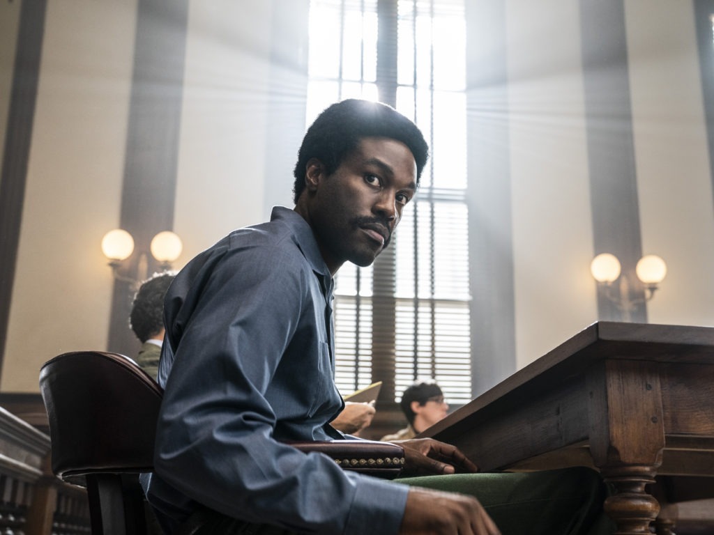 This image released by Netflix shows Yahya Abdul-Mateen II as Bobby Seale in a scene from The Trial of the Chicago 7. Niko Tavernise/AP