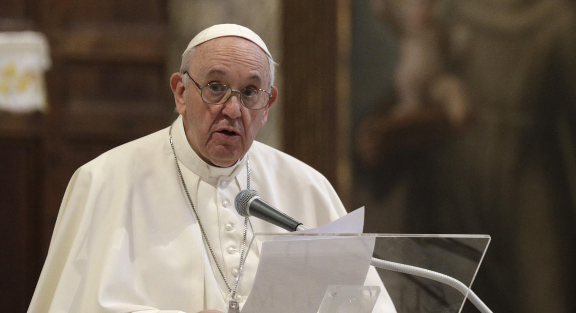 Pope Francis attends a inter-religious ceremony for peace in the Basilica of Santa Maria in Aracoeli, in Rome, on Tuesday. Gregorio Borgia/AP