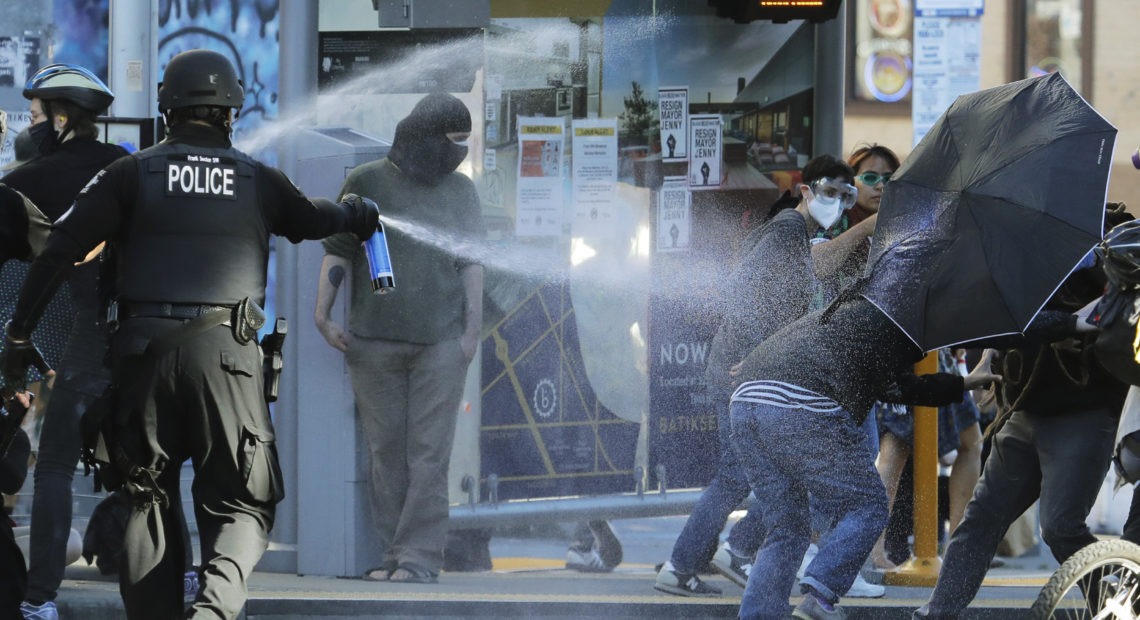 The decision on Monday was a partial victory for Black Lives Matter protesters but Judge Richard Jones found that in several instances, Seattle Police Department officers were justified in their use of less lethal weapons. Ted S. Warren/AP