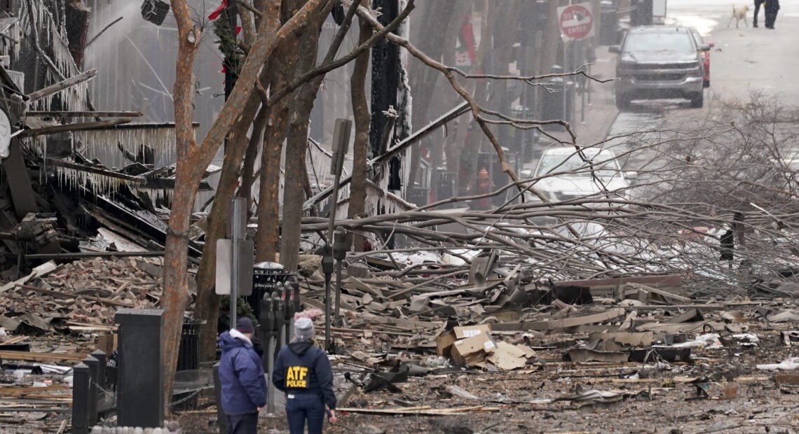 Emergency personnel work near the scene of an explosion in downtown Nashville, Tenn., on Dec. 25. CREDIT: Mark Humphrey/AP